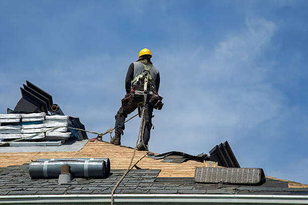 Professional Roof Replacement technician working in Oswego, NY